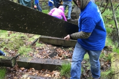 Puncheon Crew repairing a bridge on a trail behind the HNC