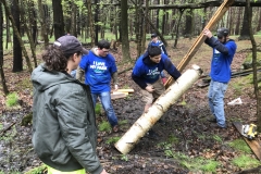 Puncheon Crew repairing a bridge on a trail behind the HNC